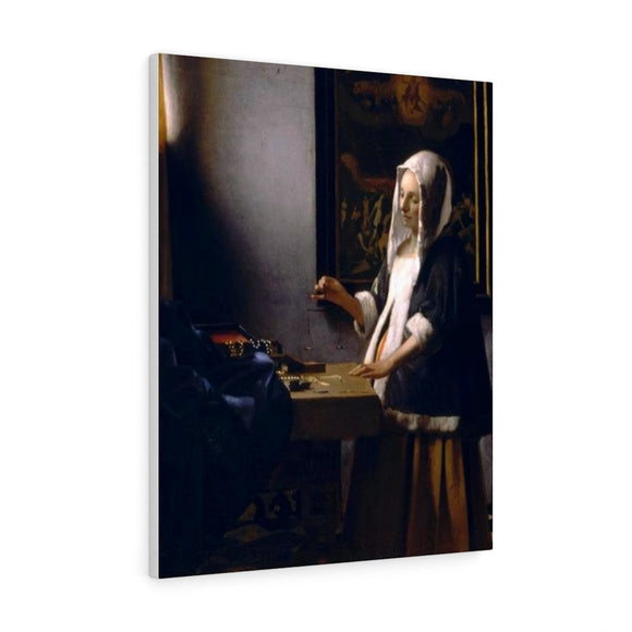Woman Holding a Balance - Johannes Vermeer